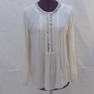 Ellie Tahari offwhite silk shirt with black braid detail and pleats